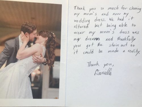 Thank you note with photo of groom kissing bride