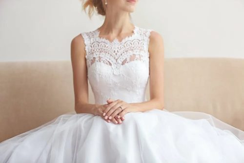 Seated woman in wedding dress